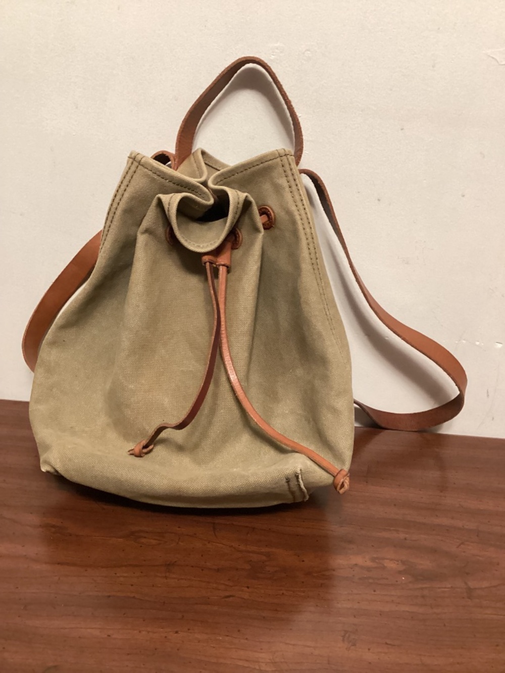 MADEWELL canvas with leather handle and strap backpack with pull string closure
